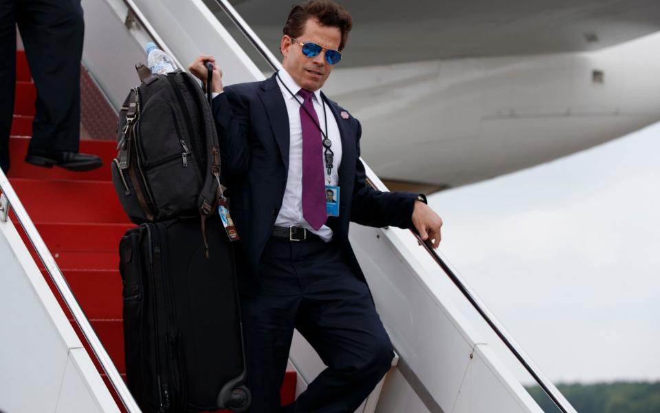 In this July 28, 2017 photo, White House communications director Anthony Scaramucci walks down the steps of Air Force One after arriving at Long Island MacArthur Airport in Ronkonkoma, for a speech by President Donald Trump - Credit: AP