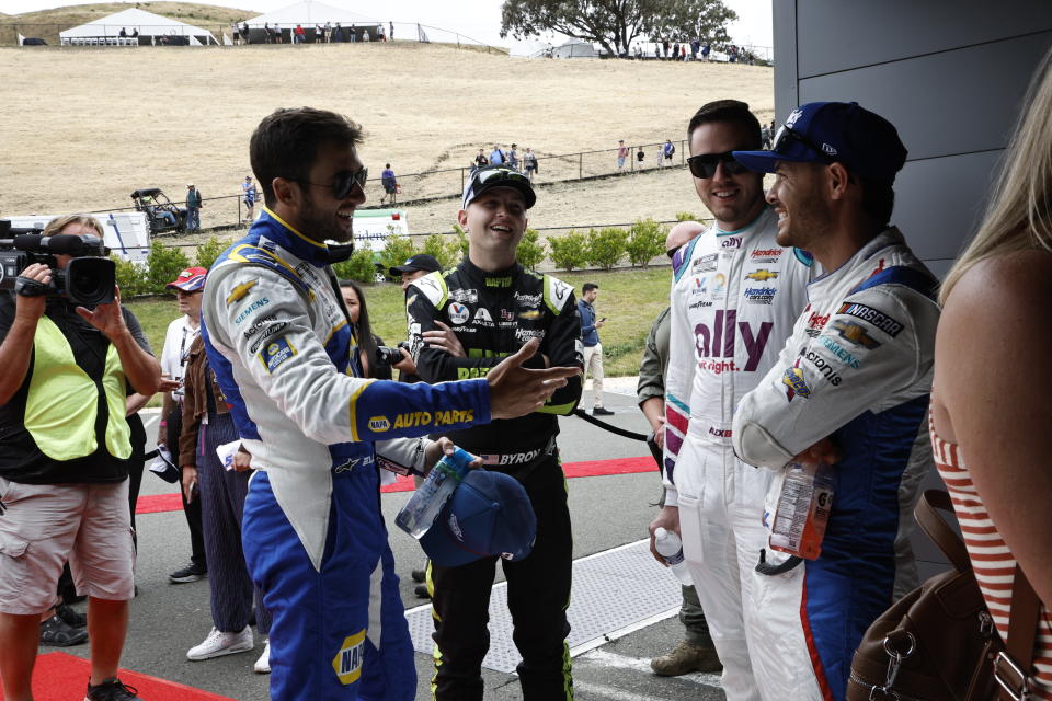 SONOMA, CALIFORNIA - JUNE 12: (L-R) Chase Elliott, driver of the #9 NAPA Auto Parts Chevrolet, William Byron, driver of the #24 RaptorTough.com Chevrolet, Alex Bowman, driver of the #48 Ally/Better Together Chevrolet, and Kyle Larson, driver of the #5 HendrickCars.com Chevrolet, share a laugh at the 1948 Club prior to the NASCAR Cup Series Toyota/Save Mart 350 at Sonoma Raceway on June 12, 2022 in Sonoma, California. (Photo by Chris Graythen/Getty Images)