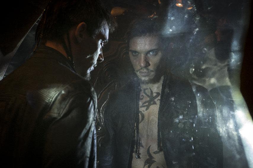 This film image released by Screen Gems shows Jonathan Rhys Meyers as Valentine in a scene from "The Mortal Instruments: City of Bones." (AP Photo/Screen Gems, Sony Pictures, Rafy)