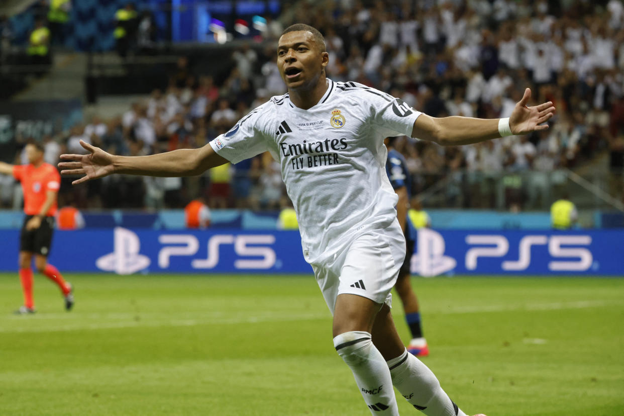 Real Madrid's French forward #09 Kylian Mbappe celebrates scoring during the UEFA Super Cup football match between Real Madrid and Atalanta BC in Warsaw, on August 14, 2024. (Photo by Wojtek RADWANSKI / AFP) (Photo by WOJTEK RADWANSKI/AFP via Getty Images)