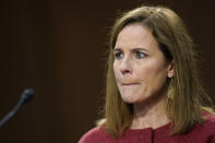 Supreme Court nominee Amy Coney Barrett listens during a confirmation hearing before the Senate Judiciary Committee, Tuesday, Oct. 13, 2020, on Capitol Hill in Washington. (AP Photo/Patrick Semansky, Pool)