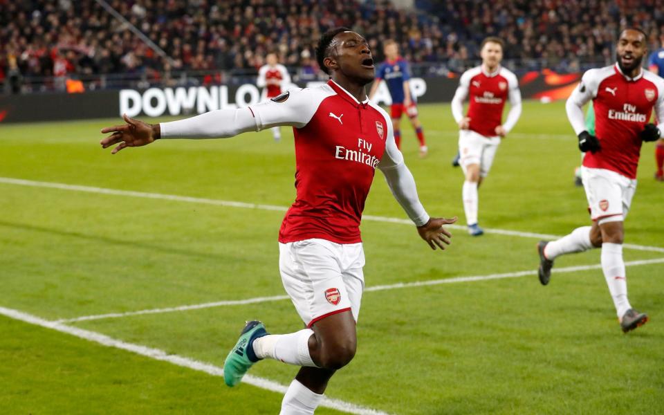 Danny Welbeck celebrates scoring for Arsenal - AP