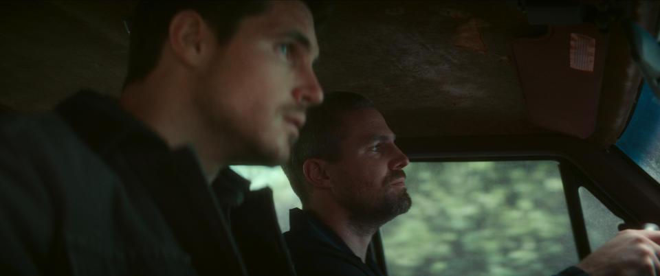 (L to R) Robbie Amell as Connor, Stephen Amell as Garrett in Code 8 Part II (Netflix)