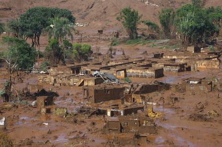 The Bento Rodrigues district is pictured covered with mud after a dam owned by Vale SA and BHP Billiton Ltd burst in Mariana, Brazil, November 6, 2015. REUTERS/Ricardo Moraes