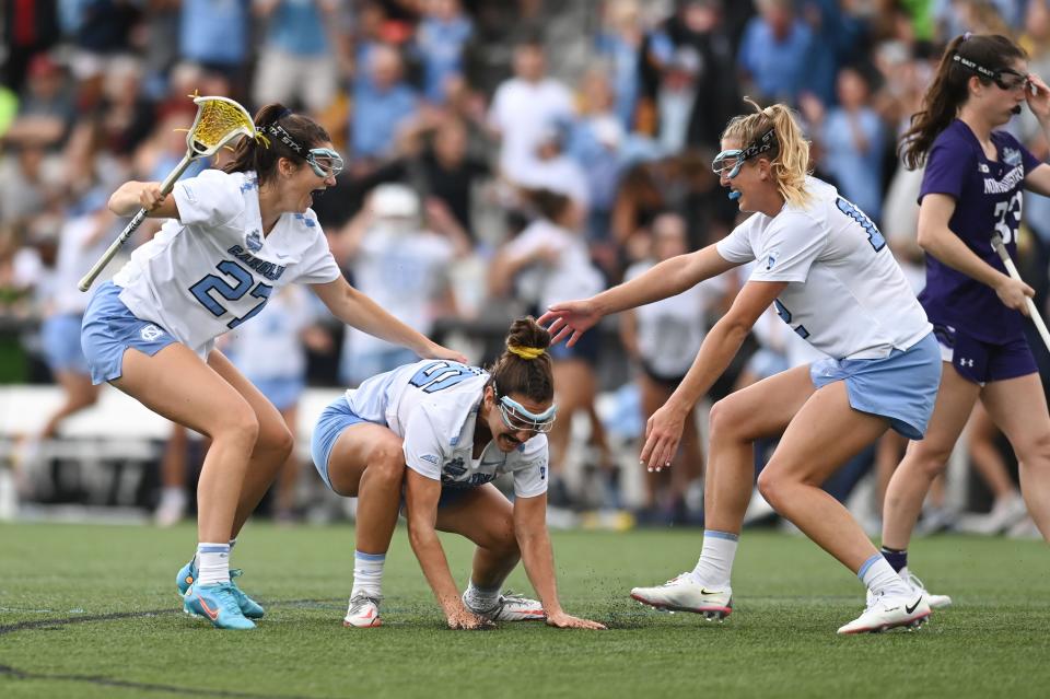 May 27, 2022; Baltimore, MD, USA;  North Carolina Sam Geiersbach (36) celebrates with teammates after scoring during the fourth quarter against the Northwestern at Homewood Field. North Carolina defeated Northwestern 15-14 to advance to the national championship. Mandatory Credit: Tommy Gilligan-USA TODAY Sports