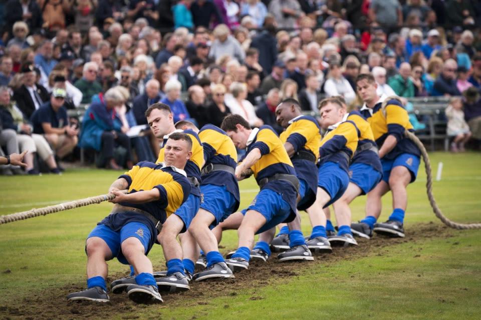 Teams of tug-of-war competitors took the strain… (Jane Barlow/PA) (PA Wire)