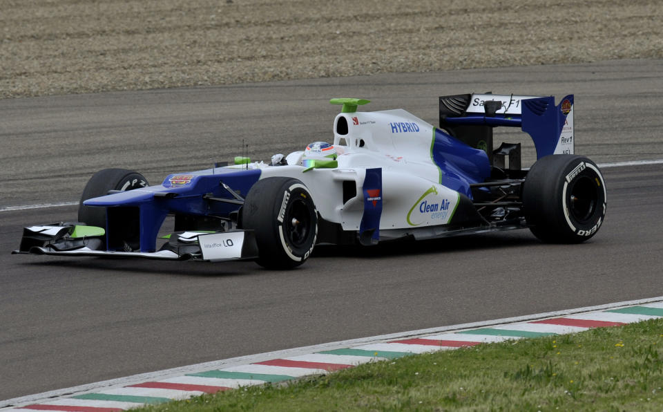 Simona De Silvestro, of Switzerland, steers a Sauber F1 2012 during a training session at Ferrari's Fiorano test track, near Modena, Italy, Saturday, April 26, 2014. Simona de Silvestro is an affiliated driver with Sauber this year with a goal of competing for a Formula One seat in 2015. The Swiss driver has spent the last four years racing in IndyCar, and scored her first career podium in October with a second-place finish at Houston. It was the first podium finish for a woman on a road course in IndyCar. The 25-year-old De Silvestro has been spending this year testing, participating in simulator training and preparing for the mental and physical demands of F1. Sauber says the goal is to help De Silvestro earn her F1 super license and prepare for a seat in 2015. (AP Photo/Marco Vasini)