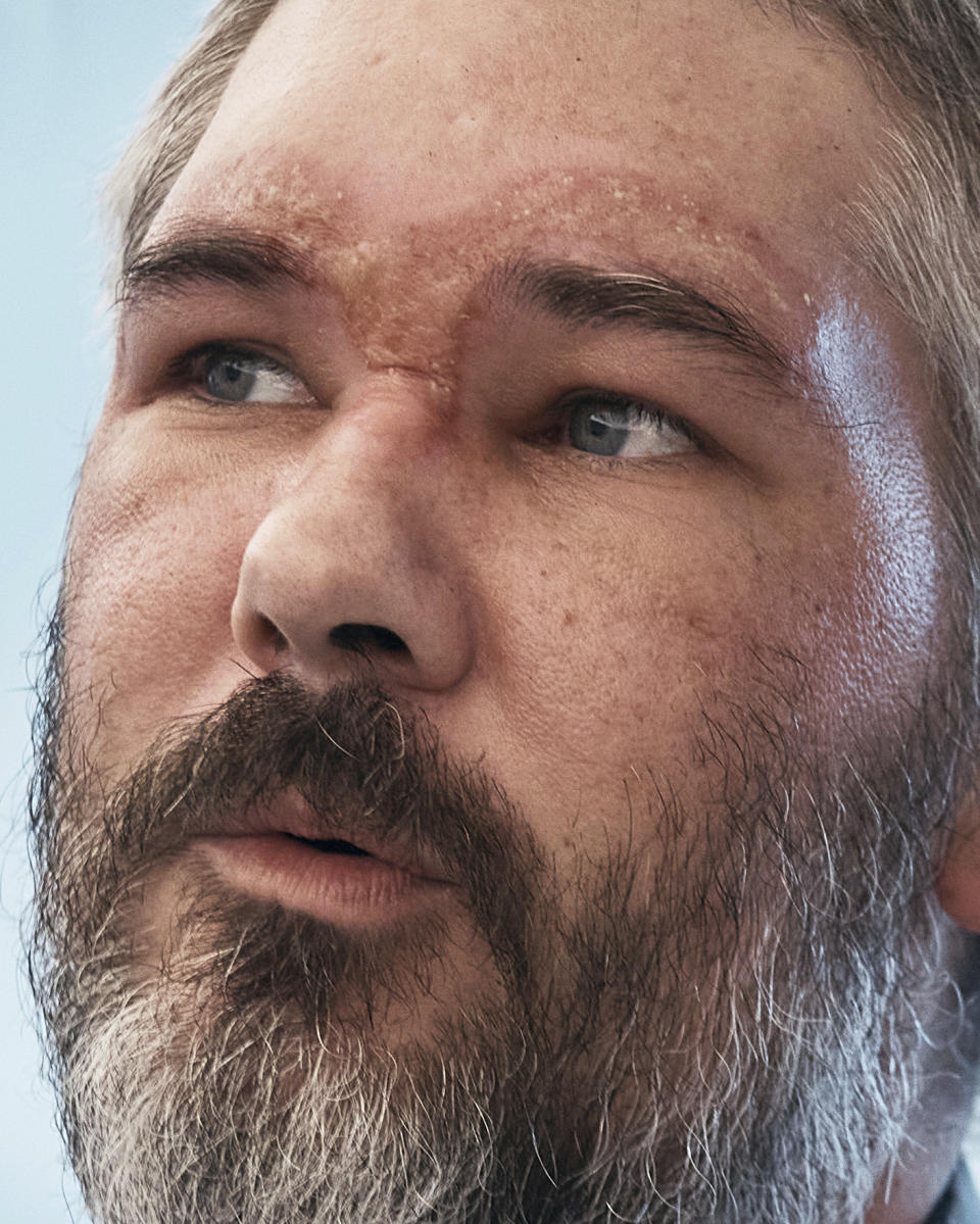 Alex Drueke gestures as he arrives at the TWA Hotel on Friday, Sept. 23, 2022 in New York. The two U.S. military veterans who disappeared three months ago while fighting Russia with Ukrainian forces were among 10 prisoners, including five British nationals, released this week by Russian-backed separatists as part of a prisoner exchange mediated by Saudi Arabia. (AP Photo/Andres Kudacki)