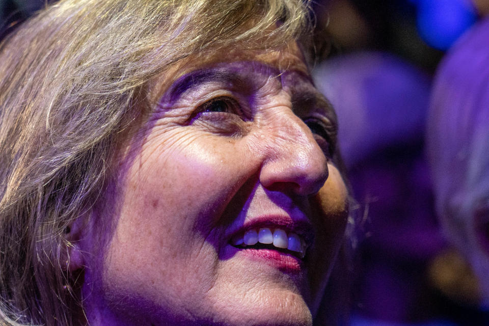 Democrat Kirsten Engel, candidate for Arizona's 6th Congressional District, cheers as election results come in during an Election Day rally for Sen. Mark Kelly, D-Ariz., at the Rialto Theatre in Tucson on Nov. 8, 2022.