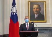 U.S. Health and Human Services Secretary Alex Azar speaks during a meeting with Taiwan's President Tsai Ing-wen, unseen, in front of a portrait of Sun Yat-sen, who is widely regarded as the founding father of modern China, in Taipei, Taiwan, Monday, Aug. 10, 2020. Azar arrived in Taiwan on Sunday in the highest-level visit by an American Cabinet official since the break in formal diplomatic relations between Washington and Taipei in 1979. (Central News Agency Pool via AP Photo)