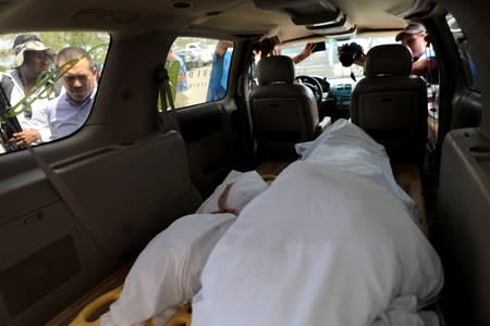 The bodies of Oscar Alberto Martinez Ramirez and his daughter Valeria, migrants who drowned in the Rio Grande river during their journey to the U.S., are seen inside a hearse in Matamoros