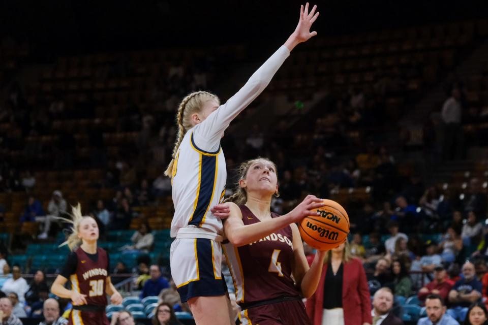 Windsor junior shooting guard Reyleigh Hess looks to shoot as a Northfield player defends during the Colorado 5A girls basketball state championships Great 8 at the Denver Coliseum in Denver, Colo., home on Friday, March 1, 2024.