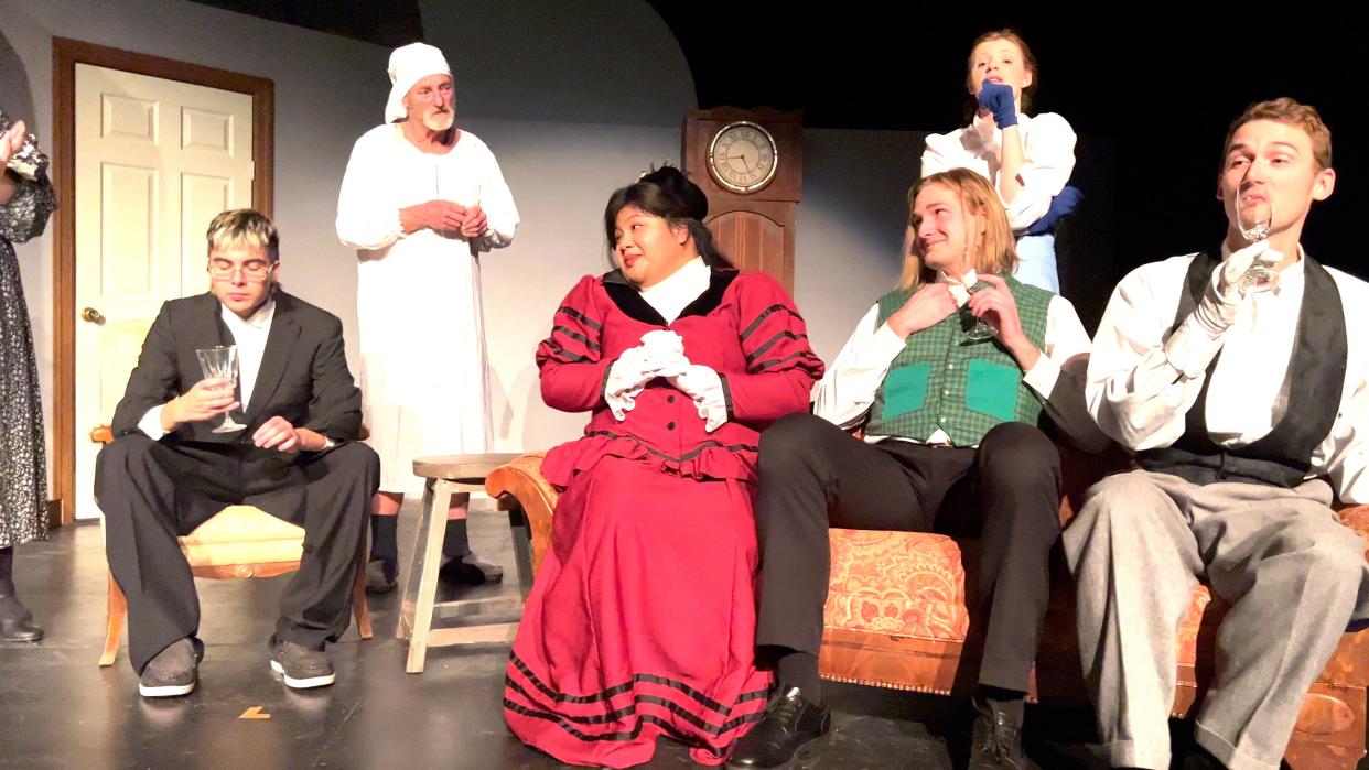 David (Chris Novak), Ebenezer Scrooge (Peter Jensen), Harriet (Khalil Uvero), Fred (Steven Fyten), Lily (Katherine Ronyak), and Topper (Brennan Norwood) perform in the adaptation of “A Christmas Carol,” produced by Better Times Theatre Company.