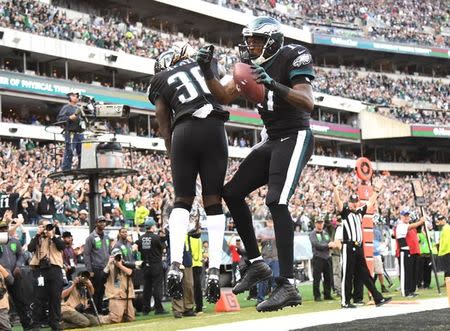 Nov 5, 2017; Philadelphia, PA, USA; Philadelphia Eagles running back Jay Ajayi (36) and Philadelphia Eagles wide receiver Alshon Jeffery (17) celebrate Jeffrey's touchdown catch during the third quarter against the Denver Broncos at Lincoln Financial Field. Eric Hartline-USA TODAY Sports