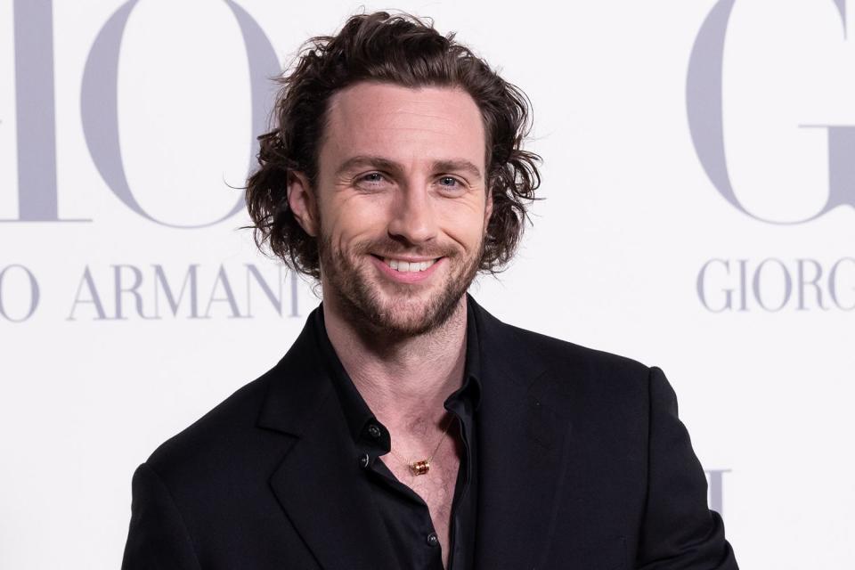 <p>Aldara Zarraoa/Getty</p> Aaron Taylor-Johnson at the 2024 Giorgio Armani show in Madrid, Spain 