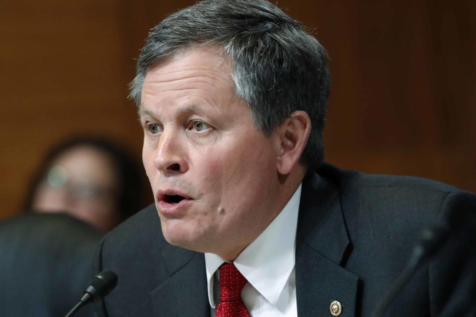 FILE - In this May 10, 2018 file photo, Sen. Steve Daines, R-Mont., asks a question during a Senate Appropriations subcommittee hearing on Capitol Hill in Washington. Montana voters on Tuesday, June 2, 2020, are choosing party nominees for governor, U.S. Senate and House and a slate of other offices in a primary election that was changed to all-mail balloting to protect against the spread of the coronavirus. Gov. Steve Bullock was expected to defeat first-time candidate John Mues for the Democratic nomination to challenge incumbent Daines.  (AP Photo/Jacquelyn Martin, File)