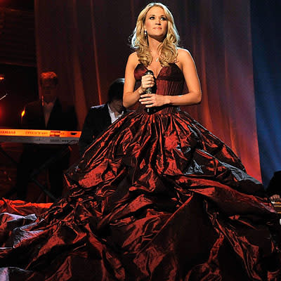 Carrie Underwood performed her song "I Told You So" while wearing this overflowing, scarlet Rafael Cennamo gown at the 2009 awards.