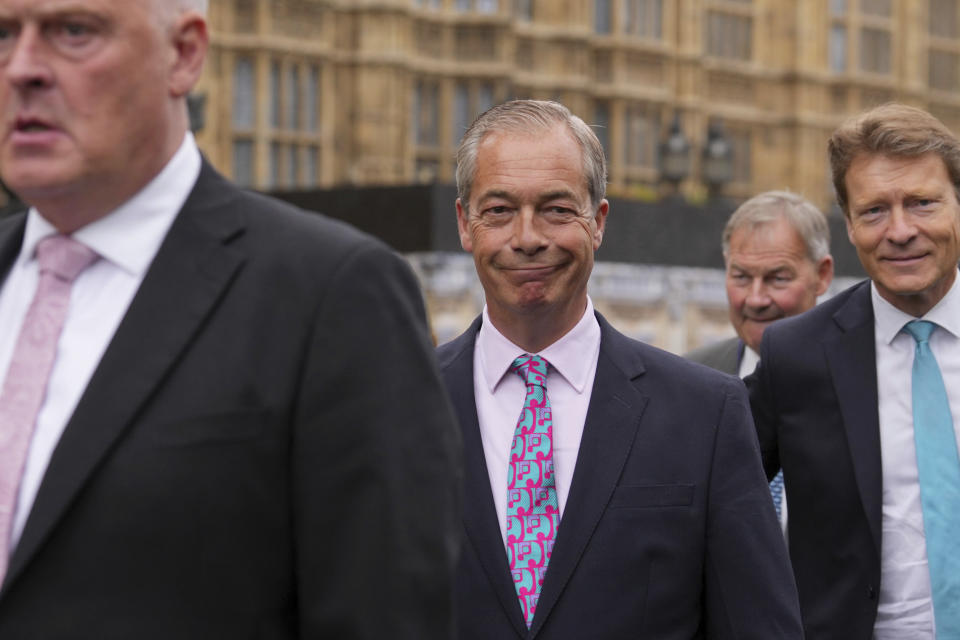 From left, Reform UK MP, Lee Anderson, Reform UK leader, Nigel Farage, Reform UK chairman, Richard Tice, and Reform UK MP, Rupert Lowe, arrive at the House of Commons in Westminster, central London, Tuesday July 9, 2024. (Maja Smiejkowska/PA via AP)