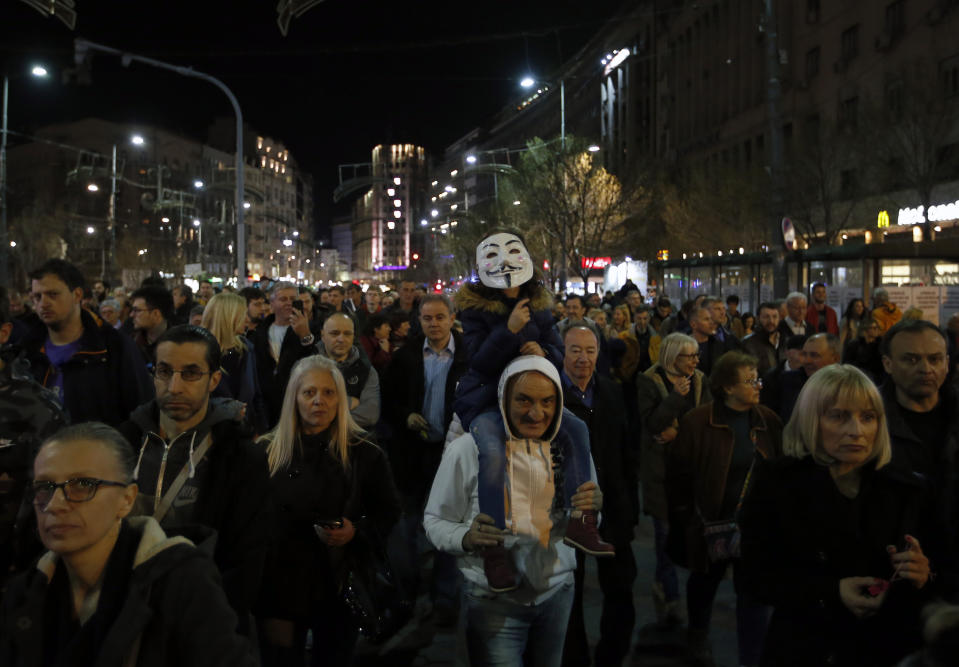 People march during a protest in Belgrade, Serbia, Saturday, March 9, 2019. The demonstrations in Serbia have lasted for three months seeking more democracy in the Balkan country that is firmly under control of the populist leader Aleksandar Vucic. (AP Photo/Darko Vojinovic)