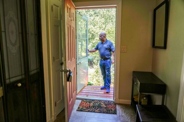 Real-estate broker Bryant Da Cruz waits for visitors at an open house in Richmond in mid-July. High prices and rising interest rates have sent a chill into market conditions this spring, usually the hottest season for home sales.