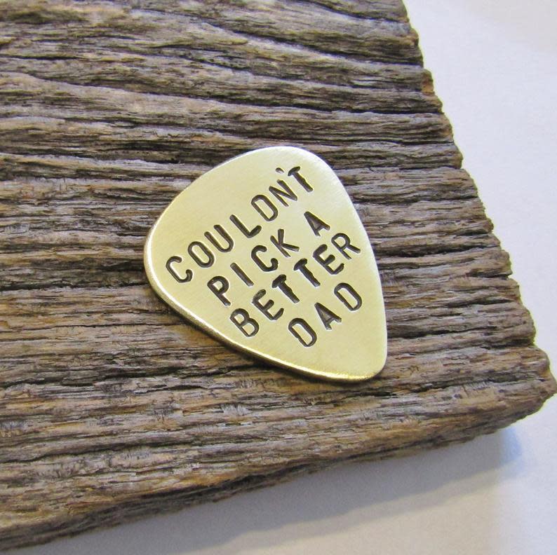 <p><a href="https://clicks.trx-hub.com/xid/hearstcorp_9eb67_tpw?q=https%3A%2F%2Fwww.etsy.com%2Flisting%2F489687070%2Fhand-stamped-guitar-pick-fathers-day&p=https%3A%2F%2Fwww.thepioneerwoman.com%2Fholidays-celebrations%2Fgifts%2Fg32814177%2Fgifts-for-dad%2F&utmSource=yahoo-us&utmCampaign=3208&utmMedium=syn" rel="nofollow noopener" target="_blank" data-ylk="slk:Shop Now;elm:context_link;itc:0;sec:content-canvas" class="link ">Shop Now</a></p><p>Hand Stamped Guitar Pick</p><p>etsy.com</p><p>$16.00</p><span class="copyright">Etsy</span>