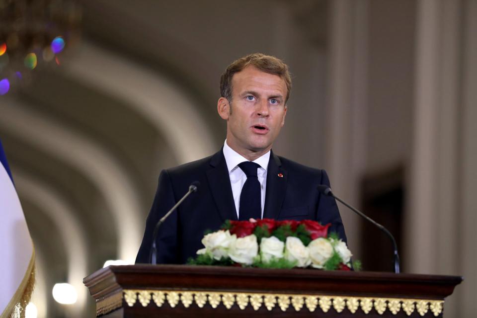 French President Emmanuel Macron holds a press conference following his meeting with Iraqi President Barham Salih during the Baghdad Conference for Cooperation and Partnership, in the Presidential Palace, Baghdad, Saturday, Aug. 28, 2021. Iraq hosts a regional conference Saturday aimed at easing tensions in the Middle East and emphasizing the Arab country's new role as mediator.(AP Photo/Khalid Mohammed)