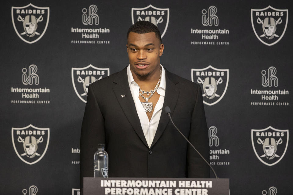FILE - Las Vegas Raiders NFL football draft pick defensive end Tyree Wilson speaks at his introductory news conference April 28, 2023, in Las Vegas. The Raiders will be without Wilson and Byron Young at the beginning of training camp because of injuries. (Heidi Fang/Las Vegas Review-Journal via AP, File)