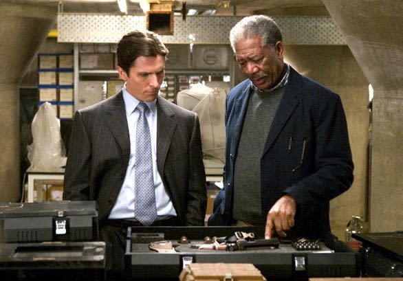 Christian Bale and Morgan Freeman in the film "Batman Begins."