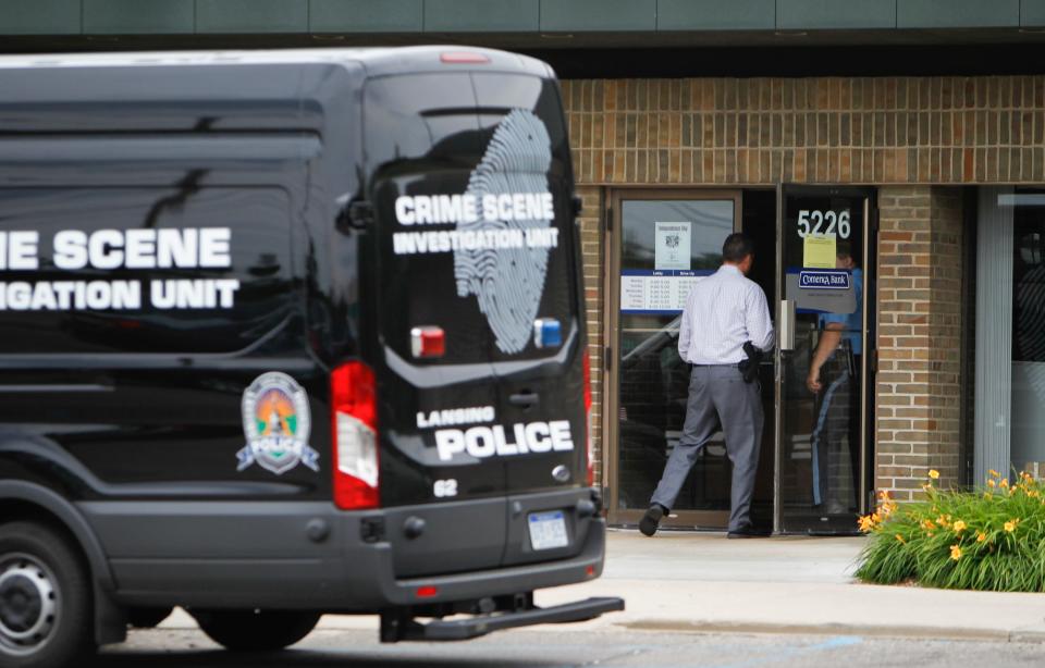 Members of the Lansing  Police Department and the FBI are on scene at Comerica Bank in the 5200 block of S. Cedar in Lansing Wednesday afternoon, June 28, 2017.   A bank robbery was reported at 2:51 p.m.   A male left the bank and left on foot.  Tracking with K-9 was unsuccessful.  [MATTHEW DAE SMITH/Lansing State Journal]