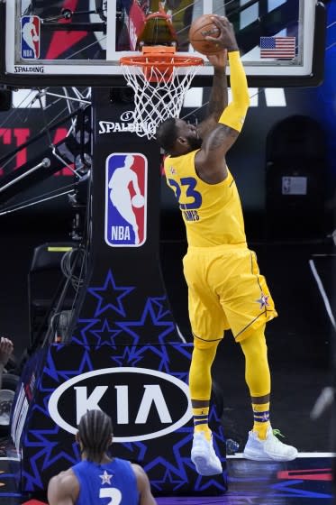 Lakers forward LeBron James dunks during the first half of the NBA All-Star Game in Atlanta on Sunday, March 7, 2021.