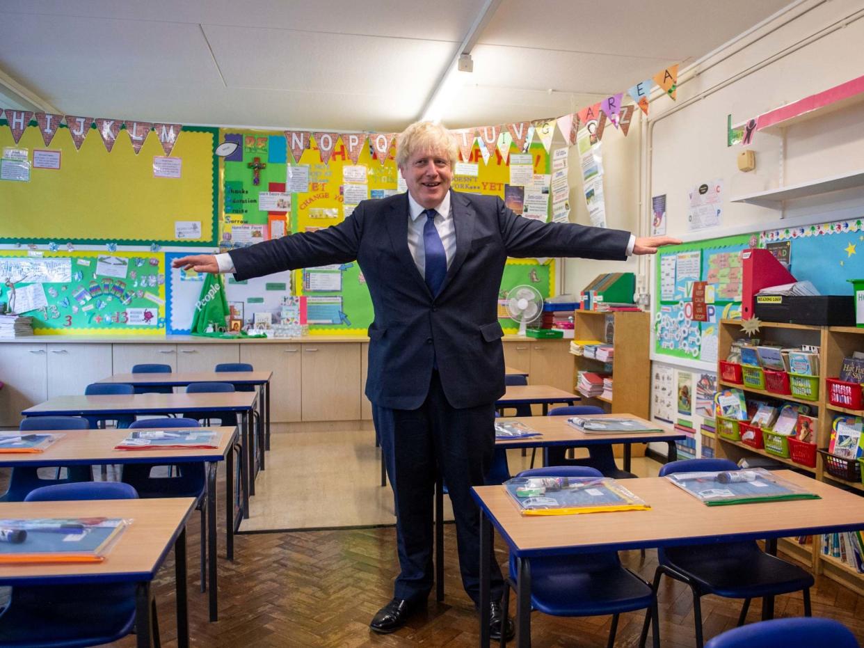Prime minister Boris Johnson visits St Joseph's Catholic Primary School in London to see the steps they are taking to be Covid-secure ahead of children returning in September: Lucy Young/Pool via AP