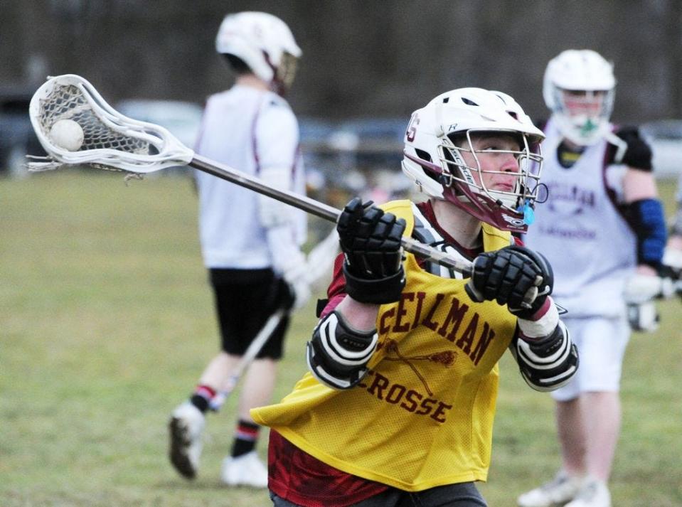 Rocky Grillone fires a shot during Cardinal Spellman High School boys lacrosse practice on Wednesday, March 29, 2017.