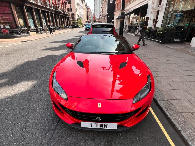 The Ferrari Portofino parked in front of Kai's restaurant in Mayfair, London.