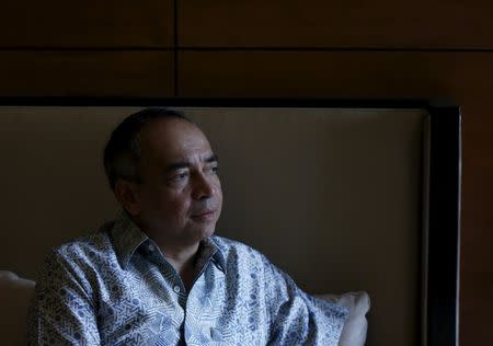 Malaysia's CIMB Chairman Nazir Razak, and brother of Prime Minister Najib Razak, attends an interview with Reuters in Kuala Lumpur, Malaysia, October 31, 2015. REUTERS/Olivia Harris