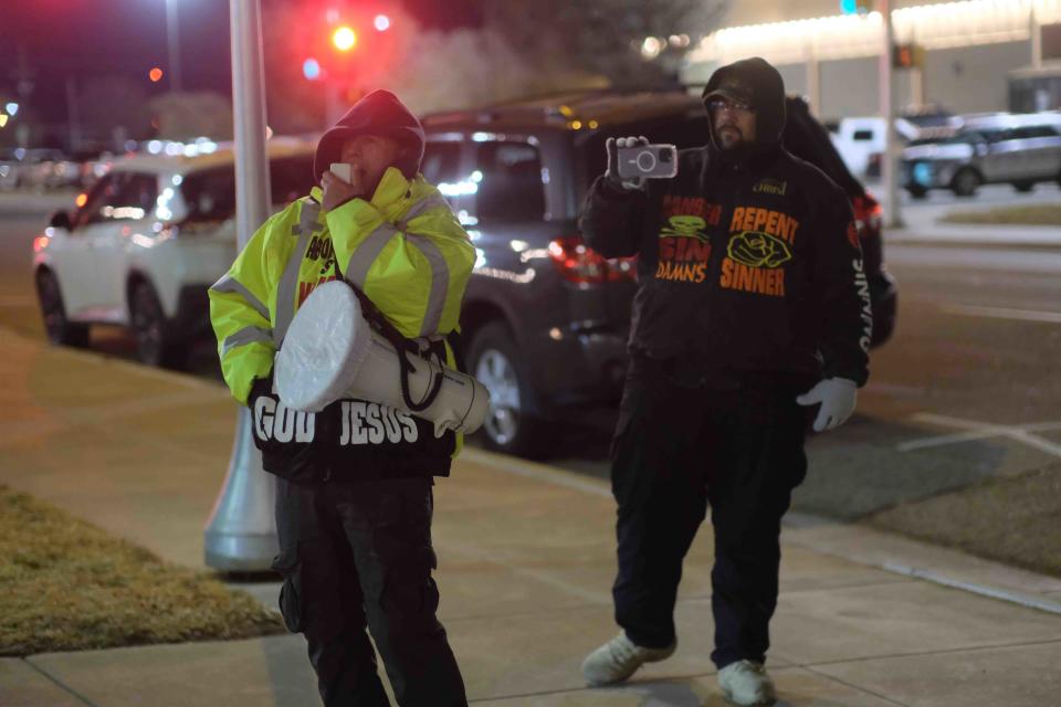 A local street preacher protests "A Drag Queen Christmas" Tuesday outside of the Globe-News Center for the Performing Arts in downtown Amarillo.