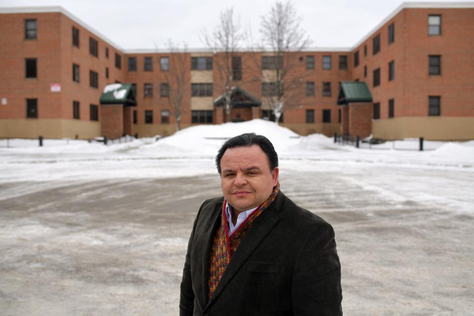 Alex Corrales outside of Curtis Apartments in Great Brook Valley, in a file photo.