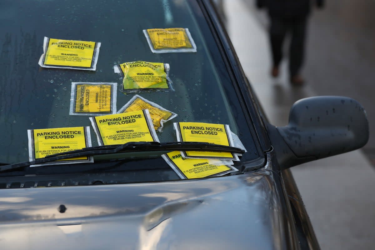 Drivers in Scotland could face a fine of £100 if they break a new pavement parking law (PA Archive)