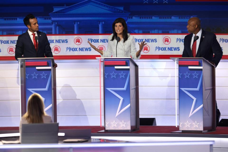 Republican presidential candidates Vivek Ramaswamy, former UN Ambassador Nikki Haley and US Sen. Tim Scott participate in the first GOP debate (Getty Images)