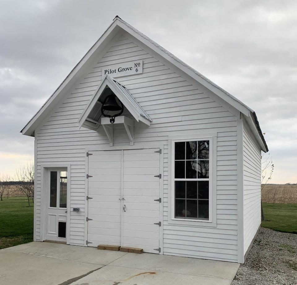 The Pilot Grove #6 one-room rural schoolhouse was relocated to East Grove Farms near Salem in 2021, and the original bell, blackboard, and a few pre-1870 desks are on display with other rural school artifacts. The one-room schoolhouse was a fixture of the early Iowa landscape.