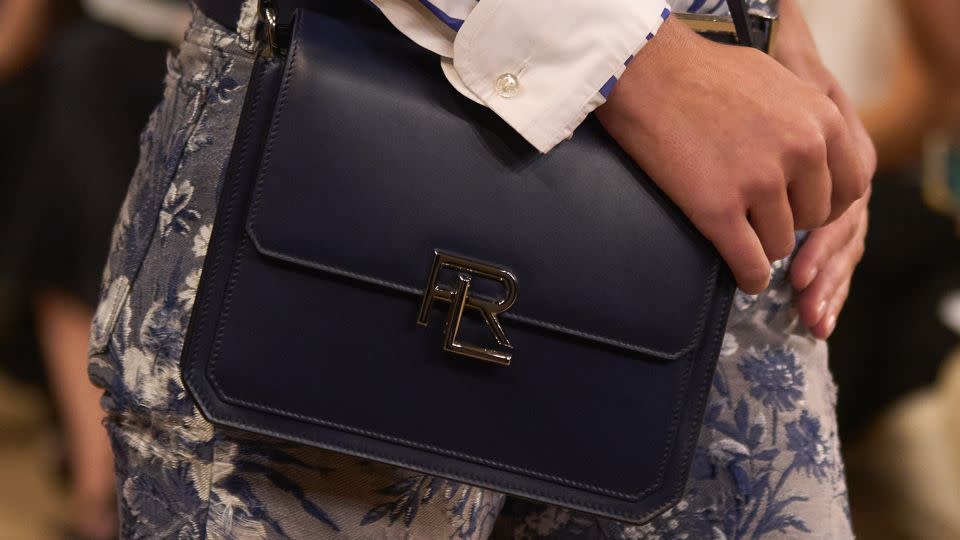 A detail shot from the collection highlights its floral detailing on denim pieces, and the brand's new RL 888 handbag. - Courtesy Ralph Lauren