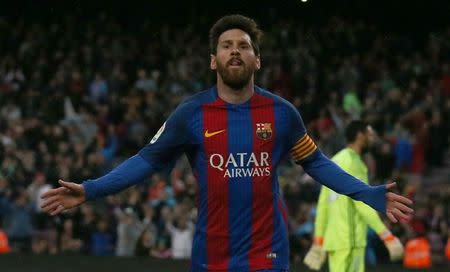 Football Soccer- Spanish La Liga Santander - Barcelona v Osasuna - Camp Nou stadium, Barcelona, Spain - 26/04/17 Barcelona's Lionel Messi celebrates a goal. REUTERS/Albert Gea