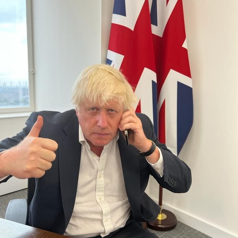 Boris Johnson on the phone today in a photograph posted by Lee Anderson, the MP for Ashfield - Lee Anderson