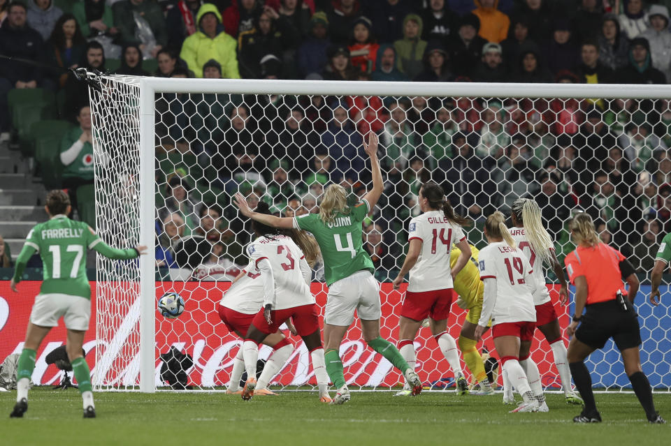 The ball goes straight into the net from a corner for the opening goal by Ireland's Katie McCabe during the Women's World Cup Group B soccer match between Canada and Ireland in Perth, Australia, Wednesday, July 26, 2023. (AP Photo/Gary Day)