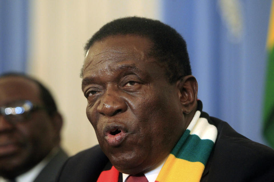 Zimbabwean President Emmerson Mnangagwa addresses a press conference in Harare ,Friday, Aug, 3, 2018. Zimbabwe's president says people are free to approach the courts if they have issues with the results of Monday's election, which he carried with just over 50 percent of the vote. President Emmerson Mnangagwa spoke to journalists shortly after opposition leader Nelson Chamisa called the election results manipulated and said they would be challenged in court. (AP Photo/Tsvangirayi Mukwazhi)