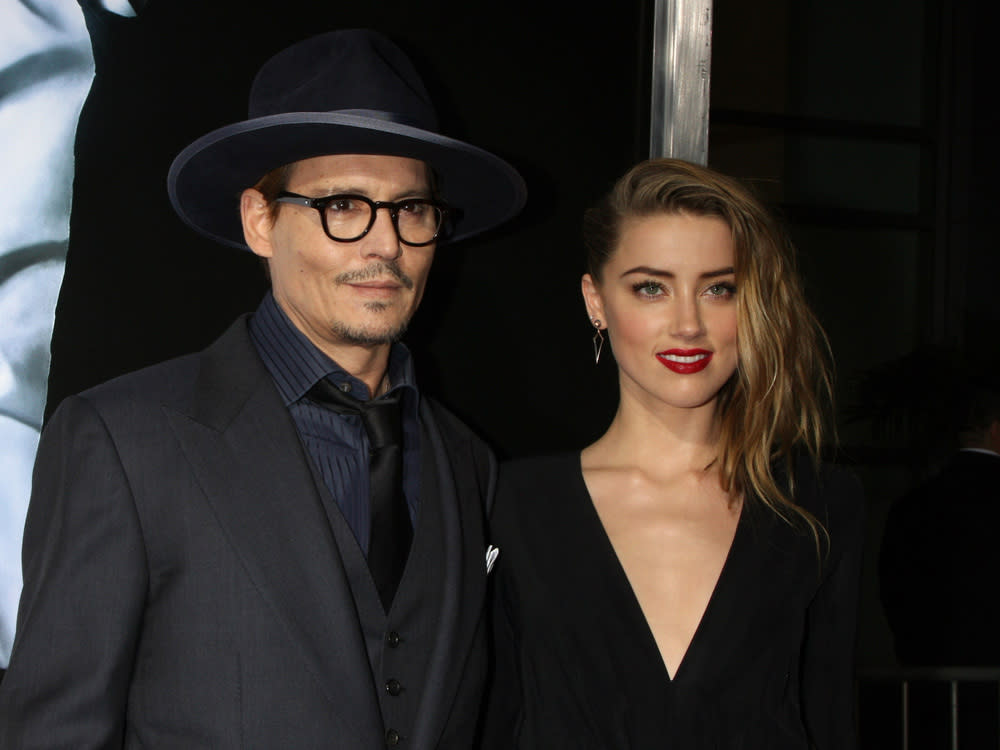 Damals schien ihre Welt noch perfekt: Amber Heard und Johnny Depp im Jahr 2014. (Bild: Kathy Hutchins / Shutterstock.com)