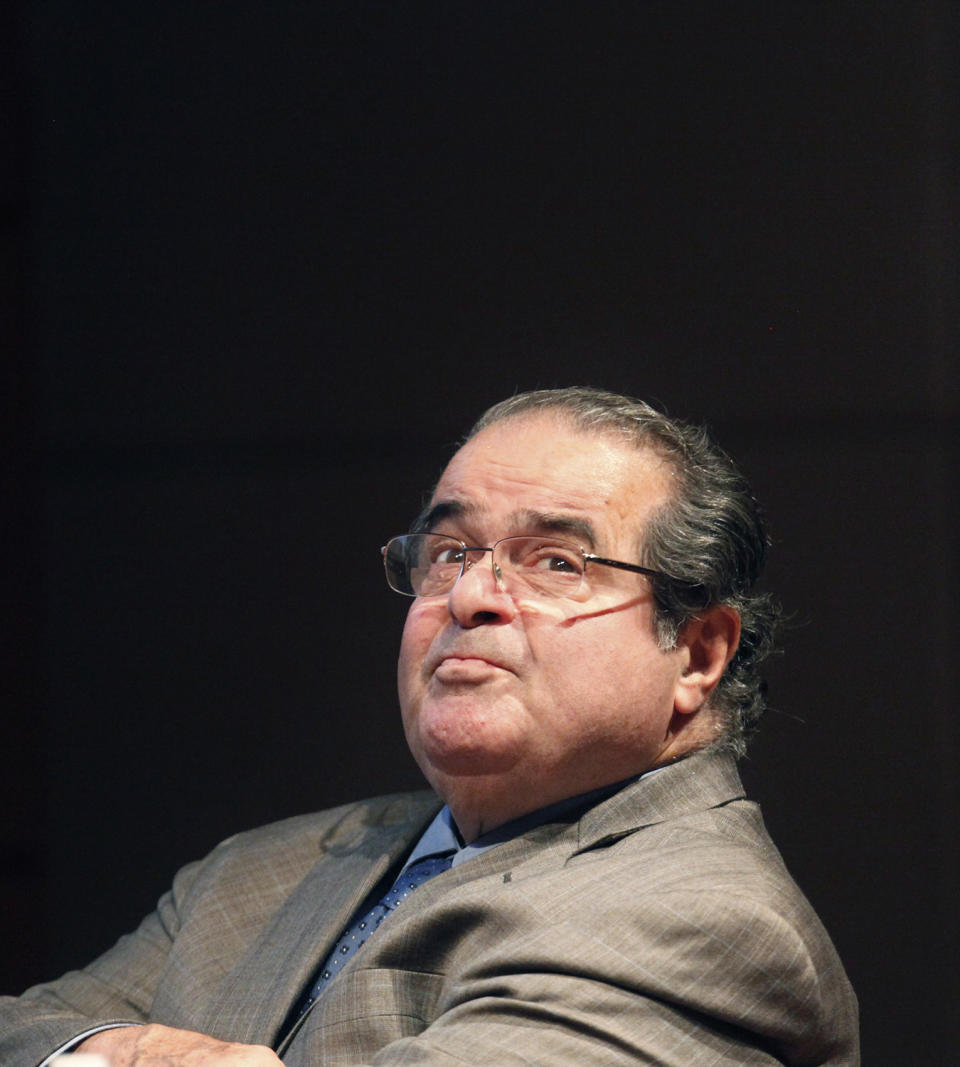 <p>When Supreme Court Justice Antonin Scalia, 79, died unexpectedly on February 13, his seat quickly became a political flashpoint. Senate Republicans refused to hold confirmation hearings on President Obama’s pick to replace Scalia, Merrick Garland. — (Pictured) U.S. Supreme Court Justice Antonin Scalia looks into the balcony before addressing the Chicago-Kent College Law justice in Chicago in 2011. (AP Photo/Charles Rex Arbogast) </p>