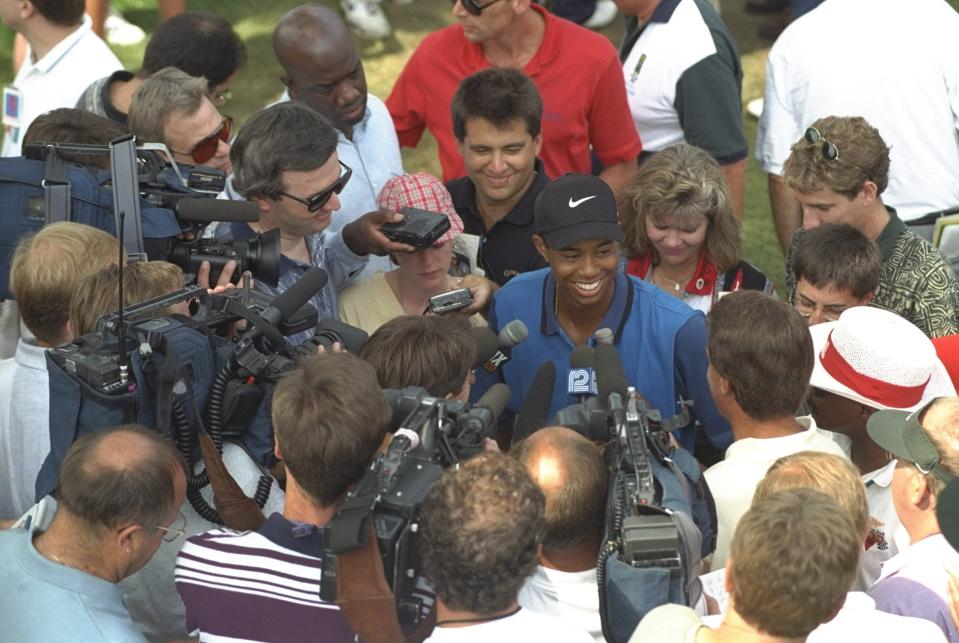 Tiger Woods meets with the media during the 1996 Greater Milwaukee Open at Brown Deer Park Golf Club in Milwaukee, Wisconsin. (Photo: J.D. Cuban/Allsport)