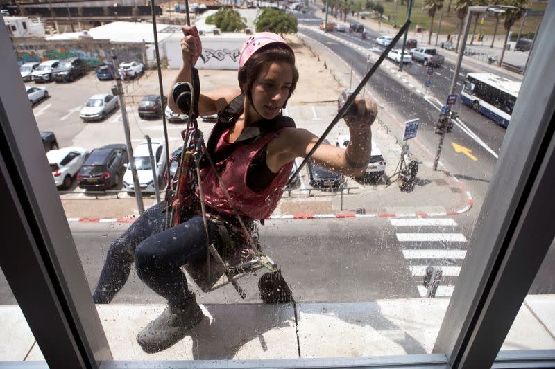 Squeegee Selfies: A TikTok star rises on Tel Aviv towers