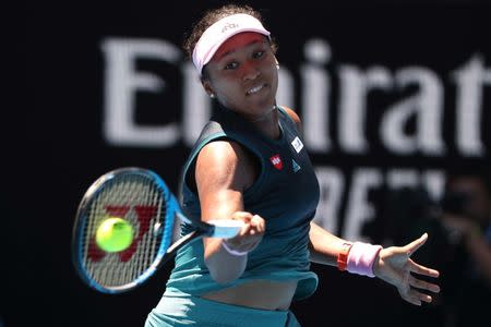 Tennis - Australian Open - Fourth Round - Melbourne Park, Melbourne, Australia, January 21, 2019. Japan's Naomi Osaka in action with Latvia's Anastasija Sevastova. REUTERS/Lucy Nicholson