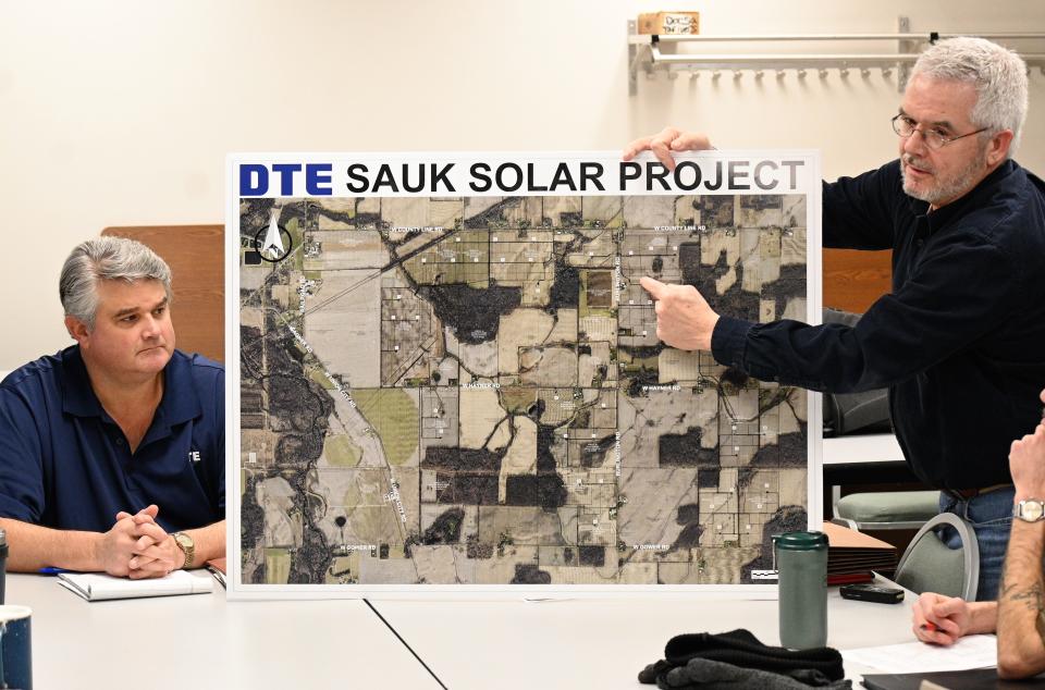 Jim Scheloske, DTE Renewable Energy Development program manager, and Jeff Haines explained the location of the Union Twp. solar farm.